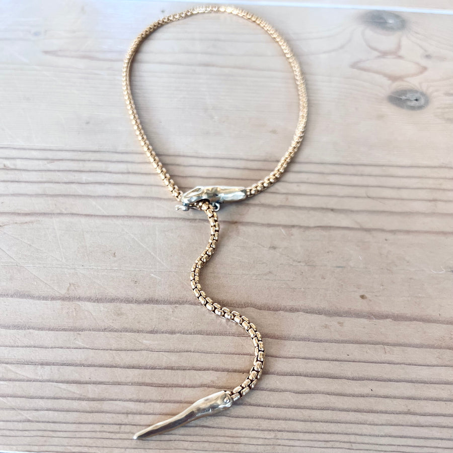 Gold 2025 serpent necklace