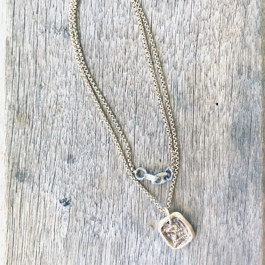 Hand to Give, Heart to Forgive Necklace